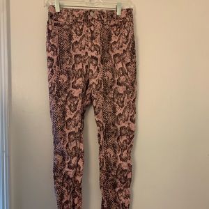 Urban Outfitters pink and black snake print jeans